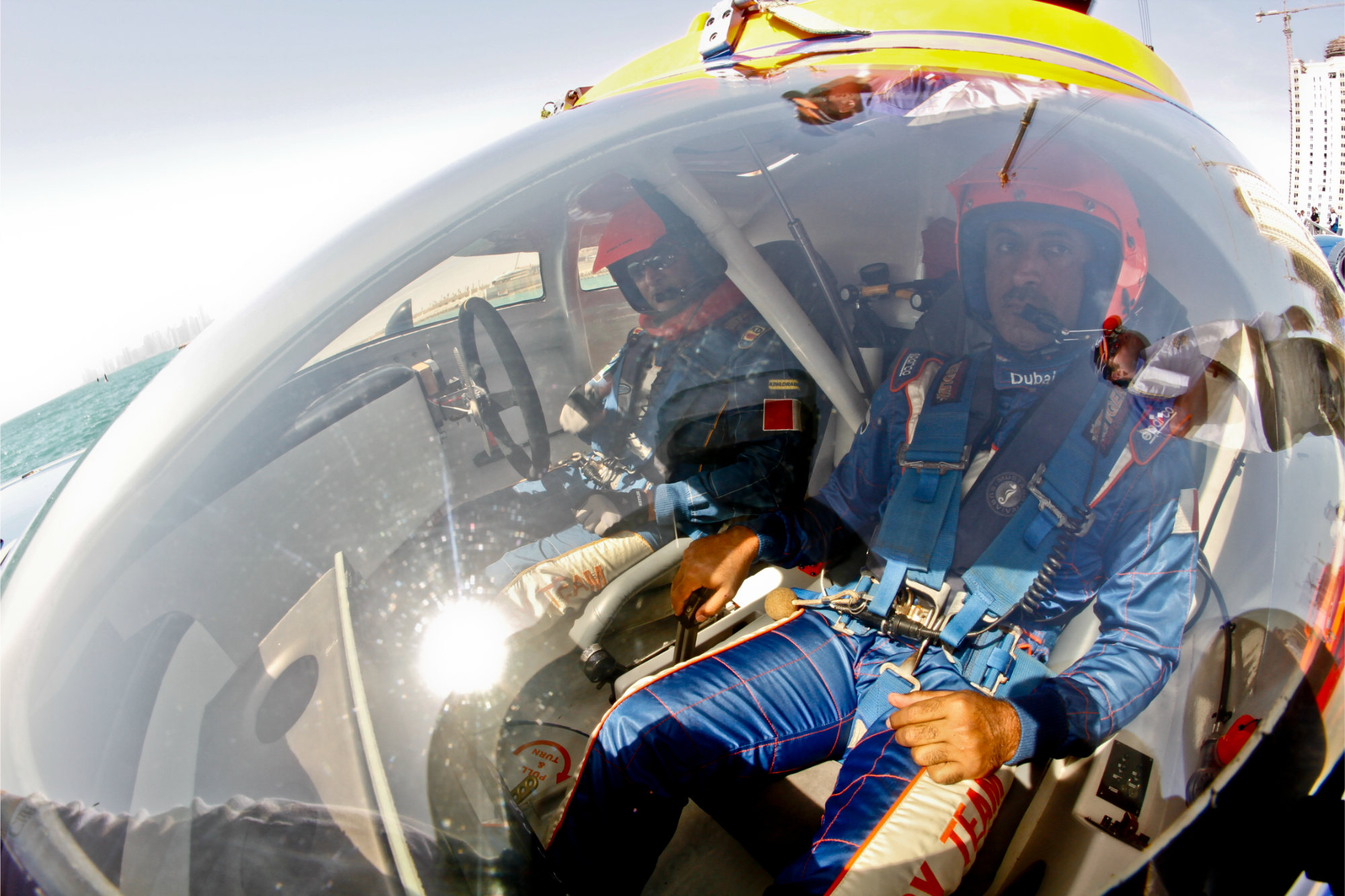 Offshore racing crew inside the cockpit
