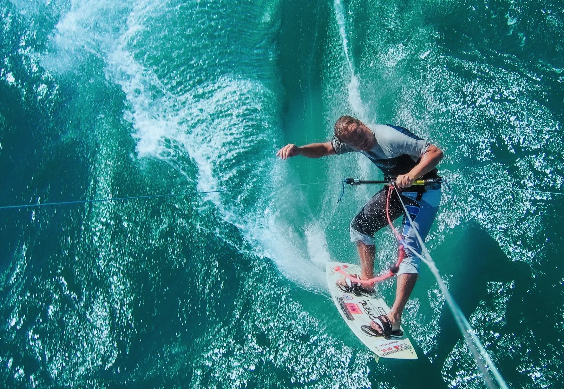 Windsurfer seen from above in open water