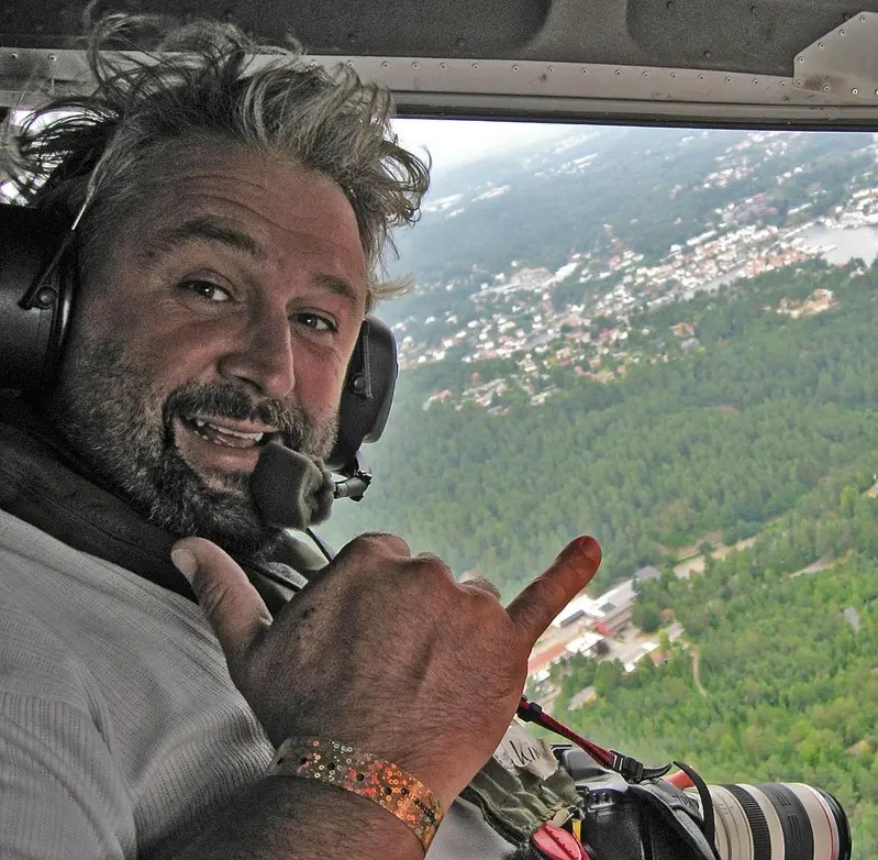 Raffaello Bastiani during an aerial photography shoot from a helicopter