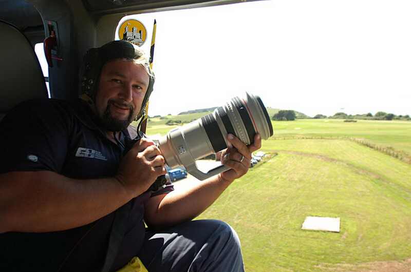 Raffaello Bastiani photographing offshore powerboats from a helicopter