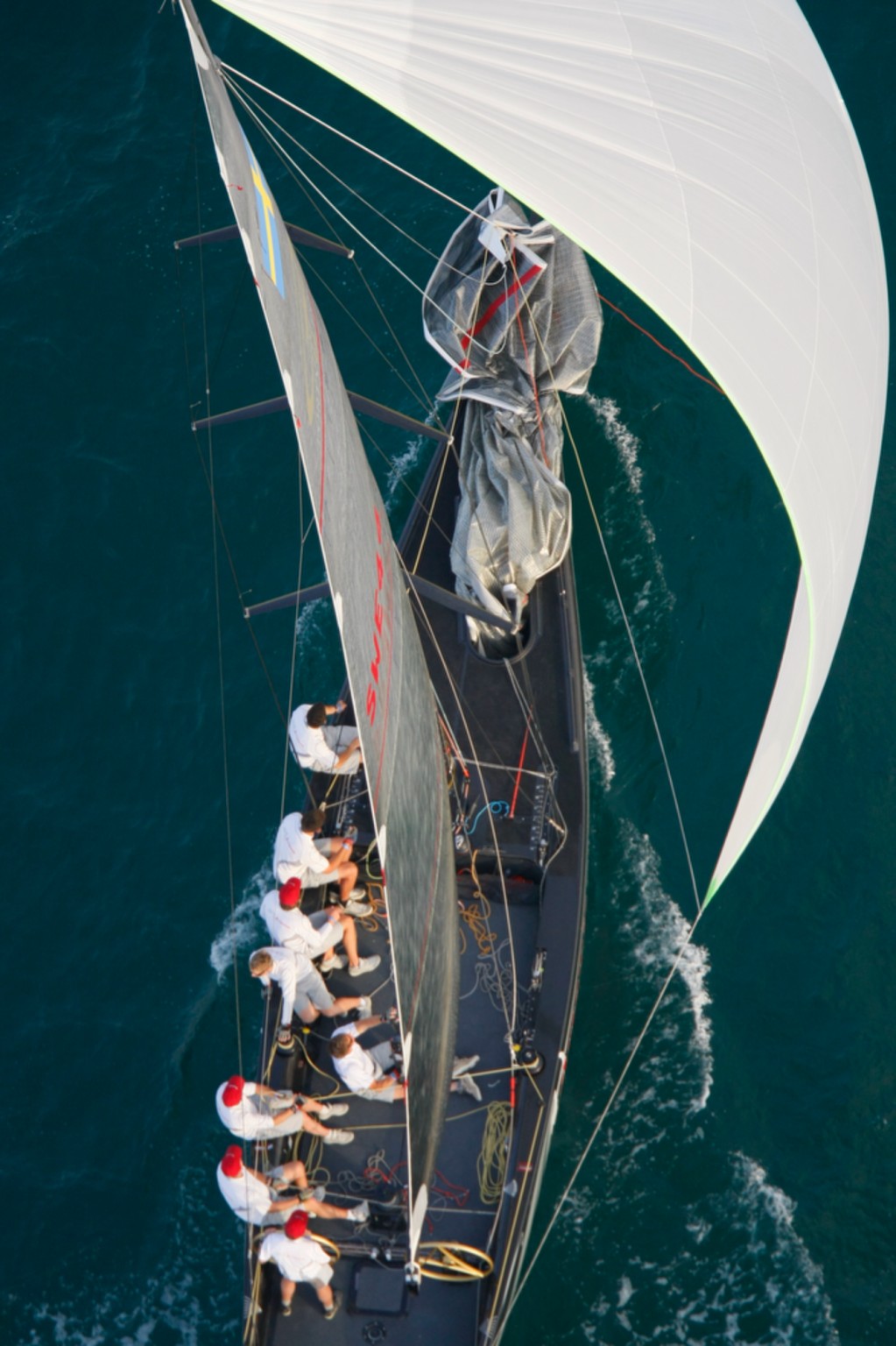 Aerial view of a racing yacht and spinnaker